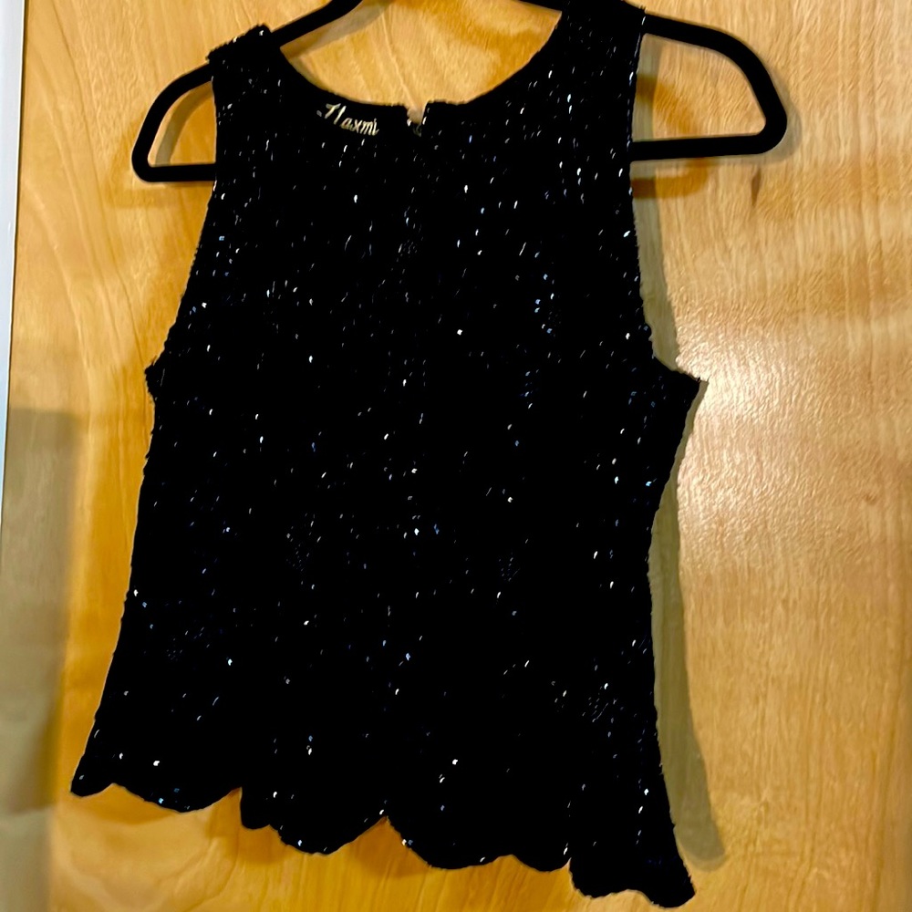 Vintage black top with breading.